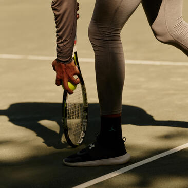 Joueur de tennis sur le court d'Amanera, resort en République dominicaine.