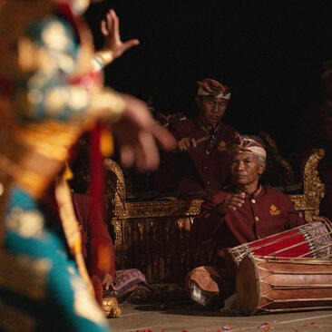 Balinese dancer in traditional costume performing at Amandari resort during Purnama Feast celebration, Ubud.