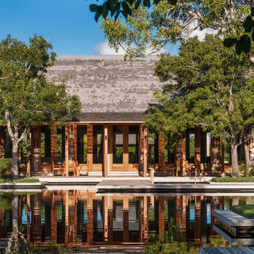 Six-bedroom beach sala villa at Amanyara, Turks and Caicos, with reflecting pool and tropical gardens.