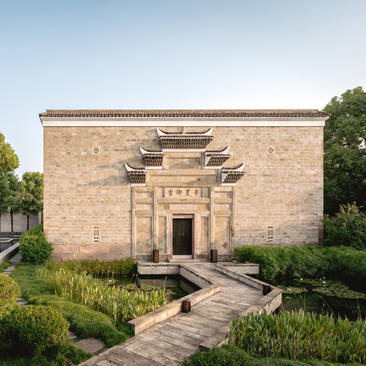 Four-bedroom antique villa at Amanyangyun, Shanghai, with traditional architecture and stone pathway.