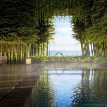 Architectural render of Aman Singapore's spa house pool at dusk, with illuminated pavilion reflected in still water.