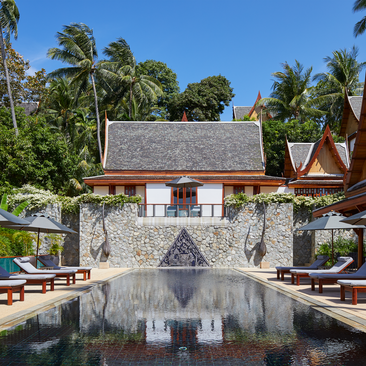 Eight-bedroom garden villa with infinity pool overlooking Thai architecture at Amanpuri resort, Thailand.