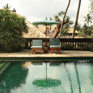 Ayung Pool Duplex Villa at Amandari, Indonesia, with emerald-tiled swimming pool and traditional pavilion.