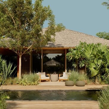 Villa pavilion with jacuzzi overlooking landscaped gardens at Amanyara, Turks and Caicos.
