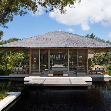 Four-bedroom beach sala at Amanyara with reflecting pool and tropical gardens.