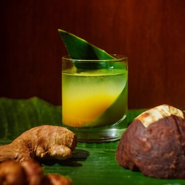 Indonesian ginger and turmeric beverage served in a glass at Amandari dining room.