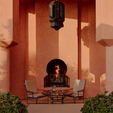 Villa courtyard with fireplace at Amanjena resort, Morocco.