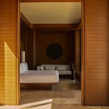 Estuary Casita bathroom at Amanvari, Mexico, with dual sinks and wooden architectural details.