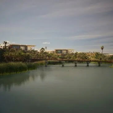 Casita exterior overlooking a tranquil river landscape at Amanvari resort, Mexico.