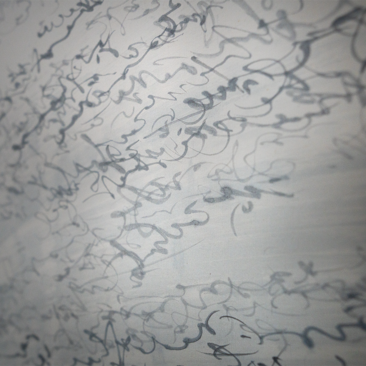 Close-up of marble surface with subtle grey veining at Aman New York.