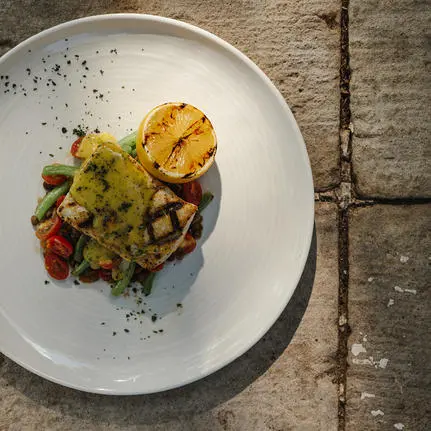 Grilled plantain topped with avocado and tomato salsa at Amanwana.