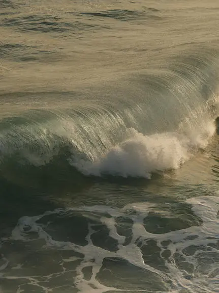 Powerful wave breaking onto the shore at Amanera resort, Dominican Republic.