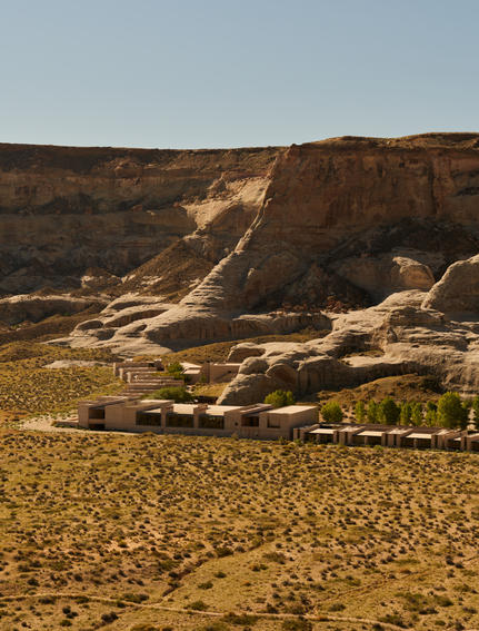 Amangiri resort nestled against rust-coloured desert cliffs in Utah, USA.