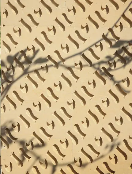 Architectural detail showing geometric patterned stone work at Aman Villas at Nusa Dua, Indonesia.