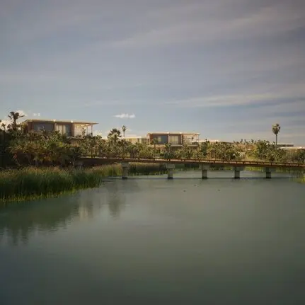 Casita exterior overlooking a tranquil river and distant landscape at Amanvari, Mexico.