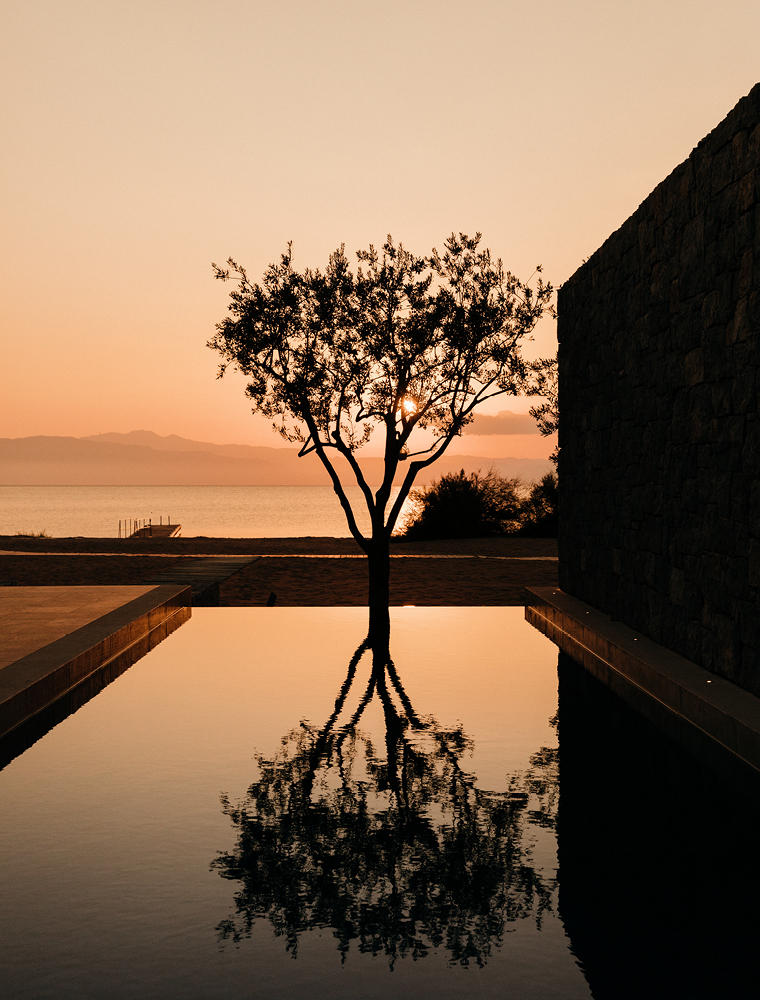 View of the beach at sunset, One-Bedroom Beach Cabana, Amanzoe, Greece