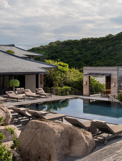 Five-bedroom residence with infinity pool overlooking forested valley at Amanoi resort.