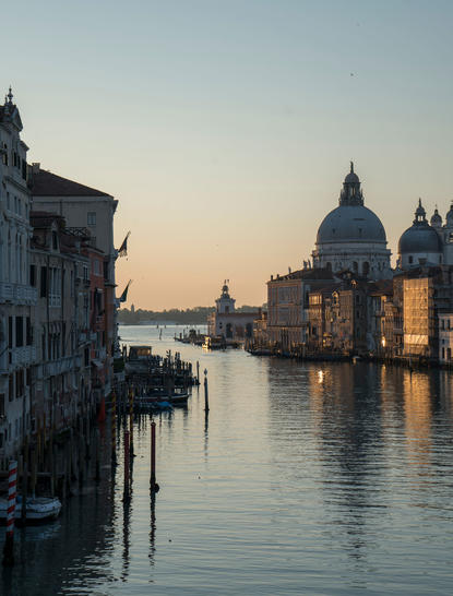 Basilica di Santa Maria della Salute reflected in the Grand Canal at dawn, Aman Venice.