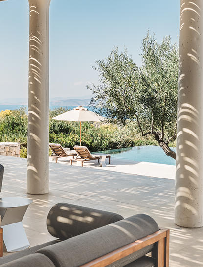 Amanzoe villa outdoor lounge area