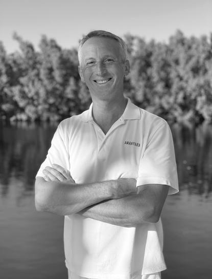 Julian Martin, General Manager at Aman Le Mélézin, black and white portrait photograph.