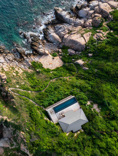 One-bedroom residence at Amanoi with direct sea access, aerial view.