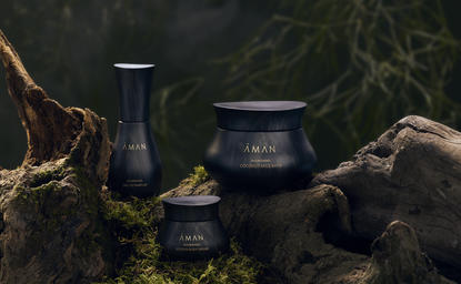 Nourishing skincare essentials displayed amongst natural wood and foliage at Amandari.