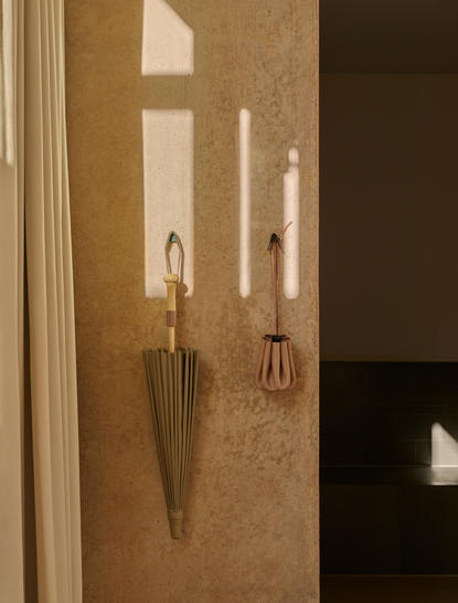 Mesa Pool Suite bathroom detail with woven wall sconces at Amangiri resort, USA.