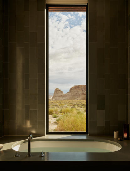 Mesa Suite bathtub with view of desert landscape at Amangiri resort.