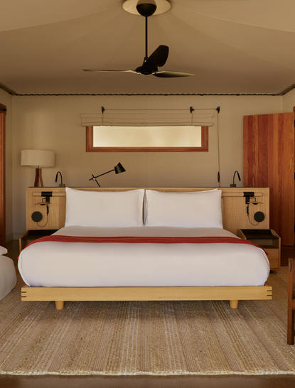Camp Sarika accommodation pavilion at Amangiri with principal bed and wooden flooring.