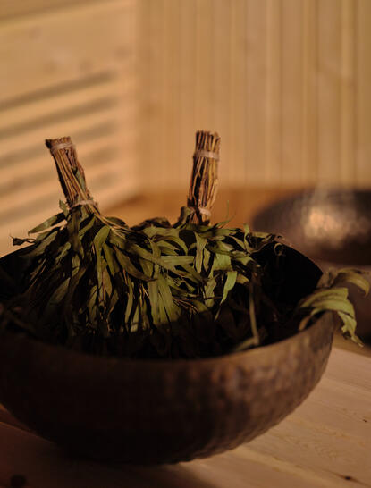 Fresh aubergines in a dark bowl at Amanpuri resort, Thailand.
