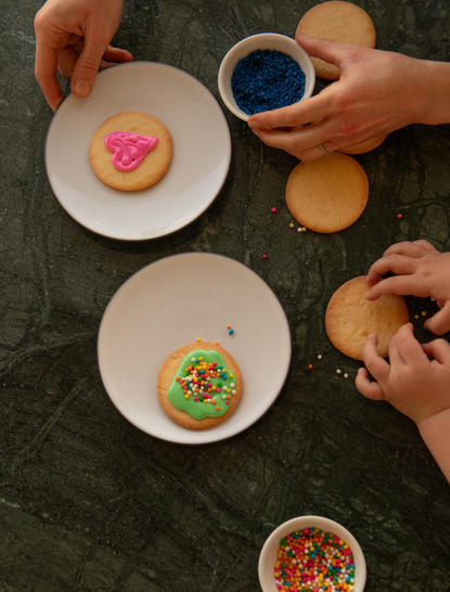 Decorated biscuits and bowls of coloured icing at Amanera, Dominican Republic.