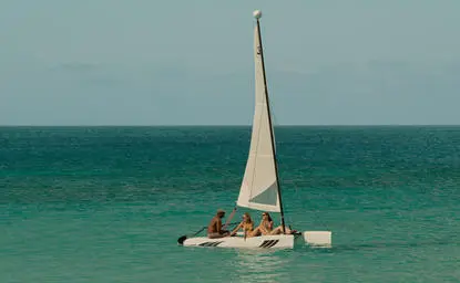 Hobie Cat sailboat on turquoise waters at Amanyara resort, Turks and Caicos.
