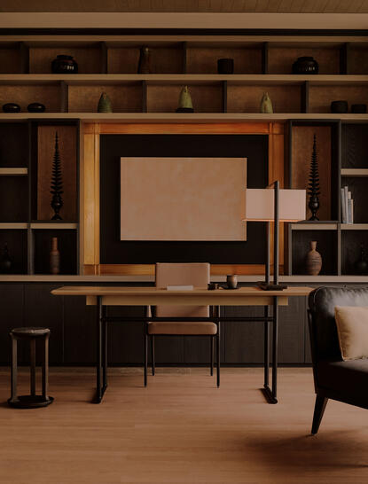 Study in an Aman Suite at Aman Nai Lert Bangkok, with wooden cabinetry and a desk.