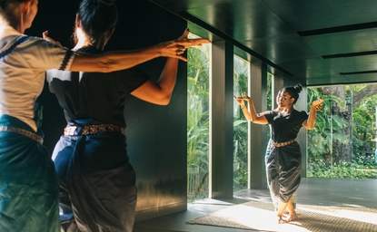 Guests practising Apsara dance at Amansara's wellness movement studio in Cambodia.