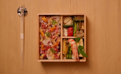 Sesui bento box containing sushi and fresh ingredients at Aman Nai Lert Bangkok.