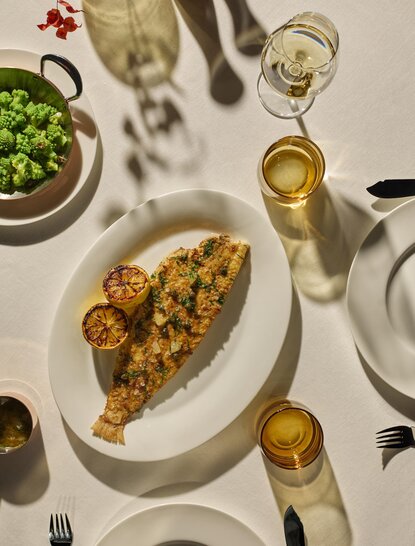 Dover sole with seasonal vegetables at Aman Venice dining venue, overhead view.
