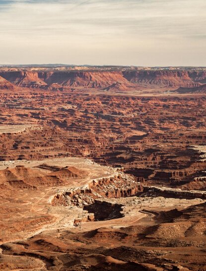 Aerial view of red rock canyonlands and desert landscape near Amangiri resort, USA.