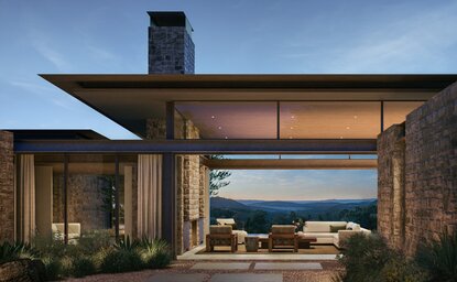 Contemporary stone residence with open-plan living area and expansive sea views at Aman Residences Amansanu.