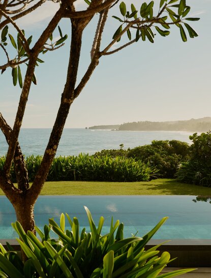 Casita with views across tropical gardens towards the Caribbean Sea at Amanera, Dominican Republic.