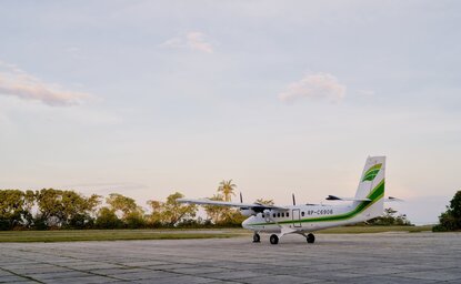 Aeroplane on runway at Amanpulo resort, Philippines.