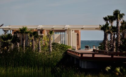 Beachfront casita at Amanvari with private pool overlooking the Mexican coast and palm trees.