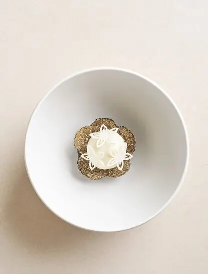 Daechu dessert presented in a white bowl at Aman Tokyo.