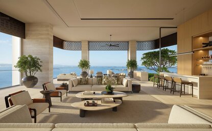 Sky villa living room at Aman Residences Singapore with panoramic city views and contemporary furnishings.