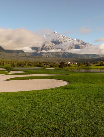 Snow-capped mountain overlooking the golf course at Amandayan, China.