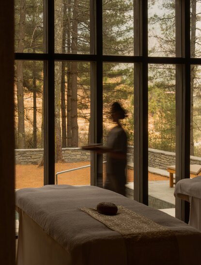 Spa House at Amankora Paro Lodge with forest view through open doors.