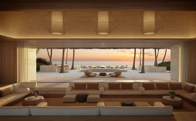 Amanolu living room with sunken seating area and expansive sea views through floor-to-ceiling windows.