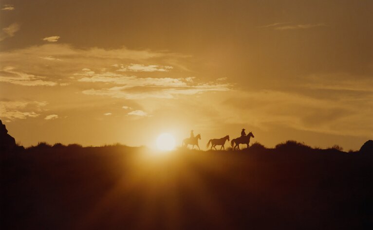 Silhouetted desert landscape at sunset, Amangiri.