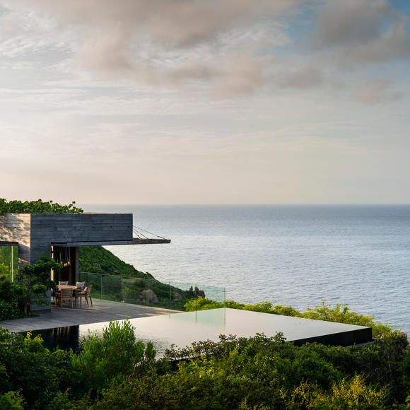 Pool and dining pavilion in a residence at Amanoi