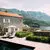 Stone suite with terrace overlooking plunge pool and mountains at Aman Sveti Stefan, Montenegro.