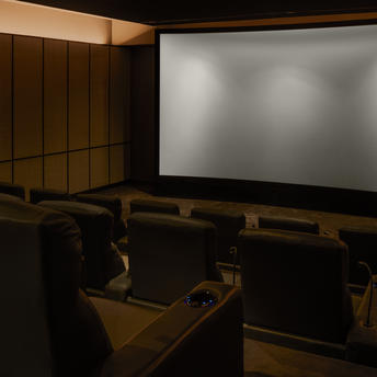 Private screening room with wooden seating at Amanyangyun.